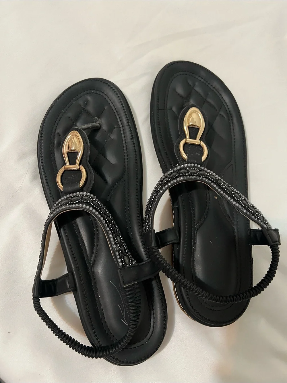 Women's Black Quilted Thong Sandals with Gold Accent